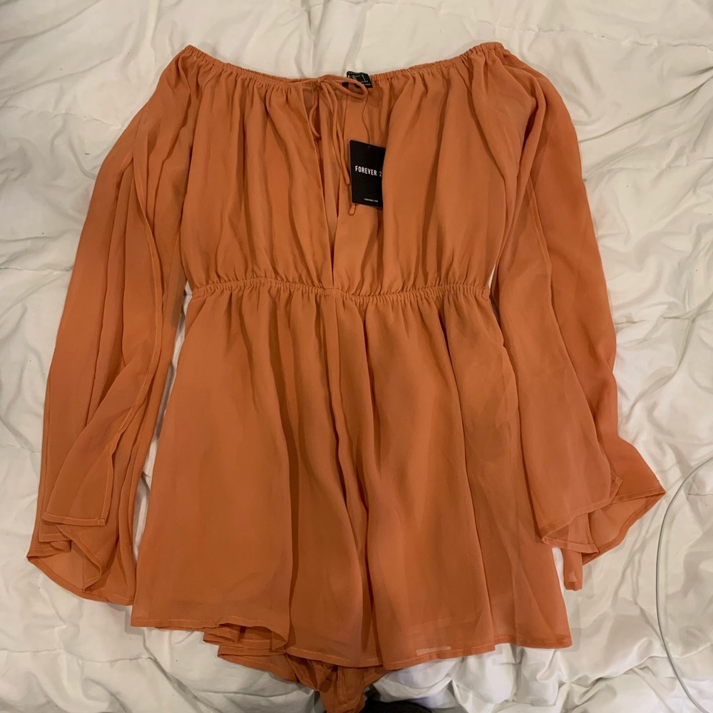Orange long sleeve romper